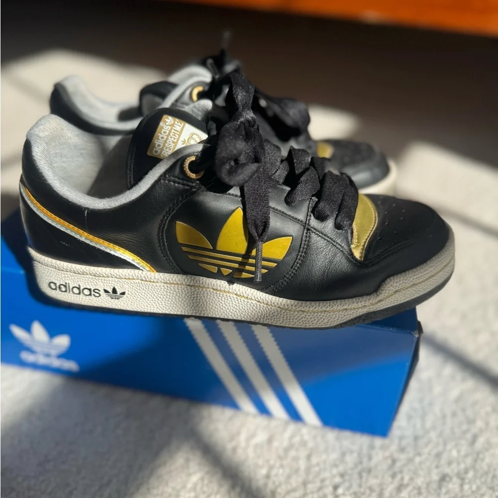 Adidas Sneakers in Black and Gold